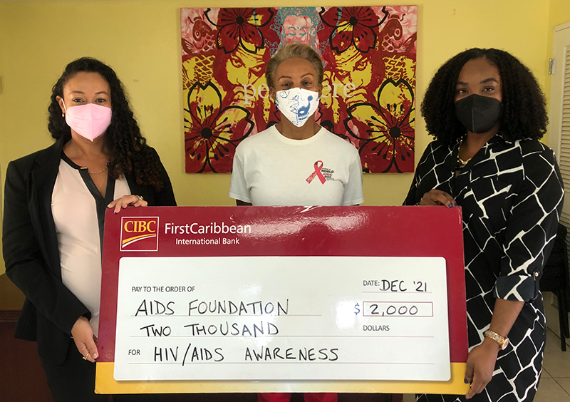CIBC FirstCaribbean observed World AIDS Day with a donation to The Bahamas AIDS Foundation. Left to Right: Nikia Christie, Marketing Manager, CIBC FirstCaribbean; Camille Lady Barnett, President, Bahamas AIDS Foundation; Kizzanae Arthur, Customer Experience Officer, Managing Director’s Office, CIBC FirstCaribbean. Words & Photo: ashley@serenawilliams-pr.com