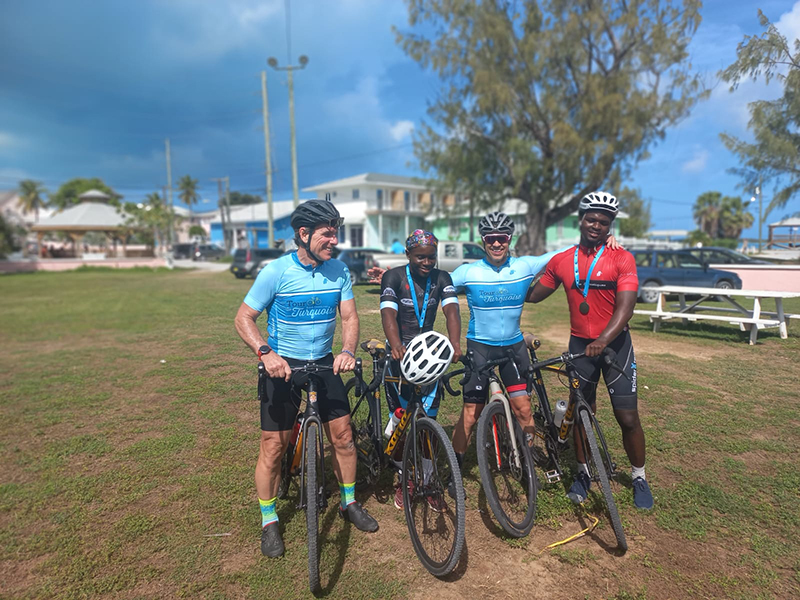 Riders: Participants from Canada pose with two members of the cycling club at LN Coakley High School. Credit: Tour de Turquoise